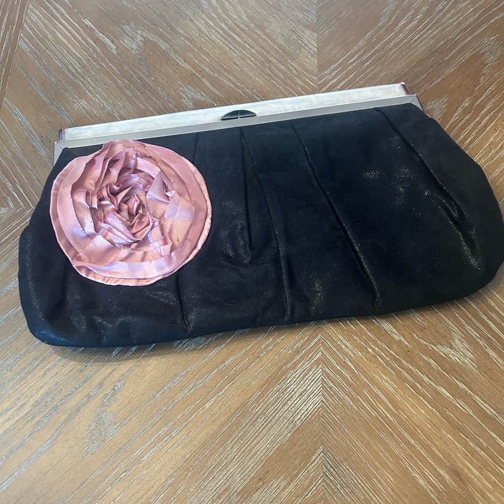 Elegant Black Clutch with Pink Flower Accent